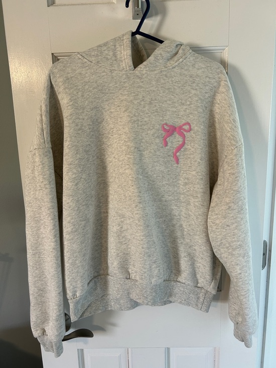 Edikted Sweaters - Edikted Light Gray Hoodie with Pink Bow Graphic